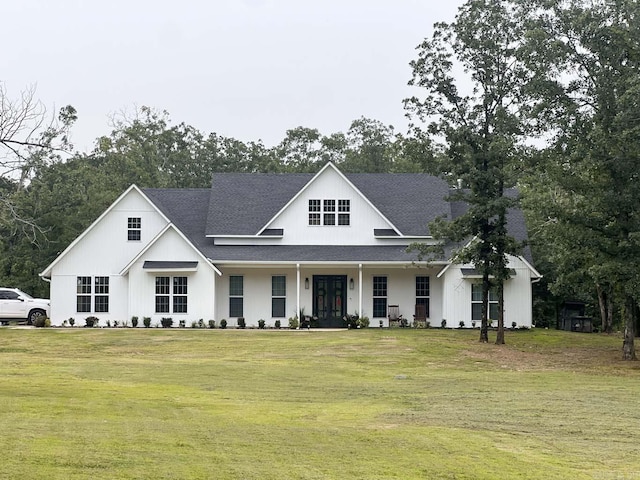 modern farmhouse with a front yard