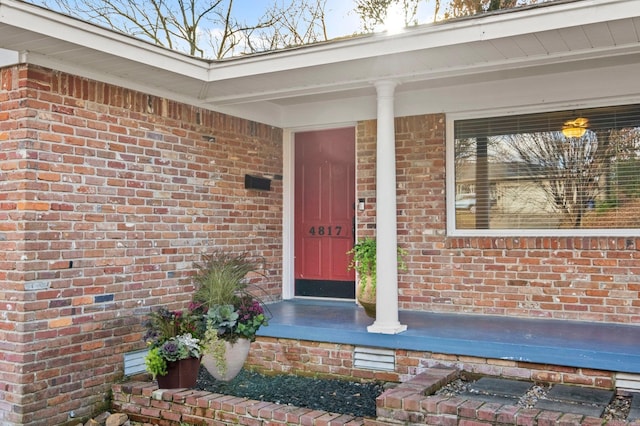 doorway to property featuring a porch