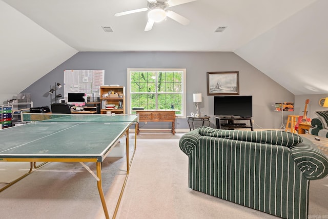 playroom featuring ceiling fan, carpet floors, and vaulted ceiling