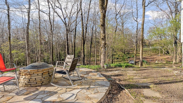 view of patio / terrace featuring a fire pit