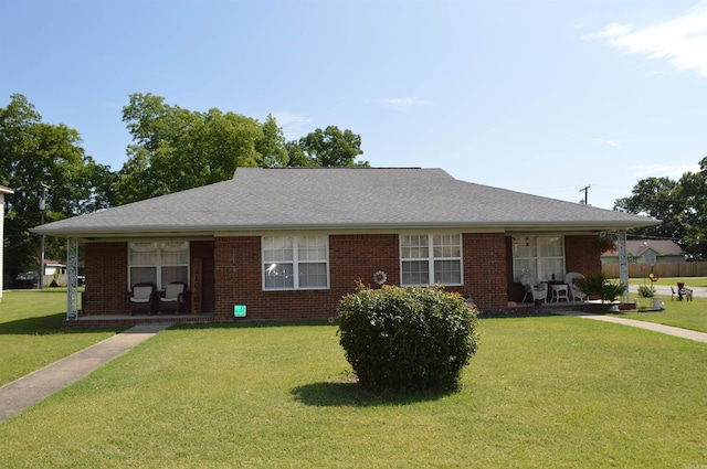 ranch-style house with a front yard