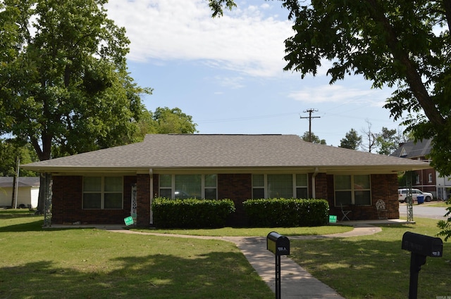 ranch-style house with a front yard