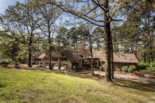 back of house with a yard