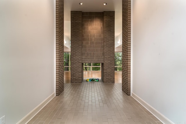 hall featuring tile patterned flooring