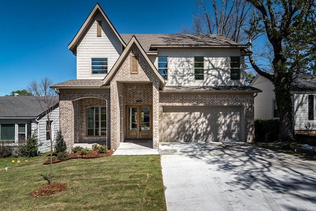 view of front of property with a front yard and a garage