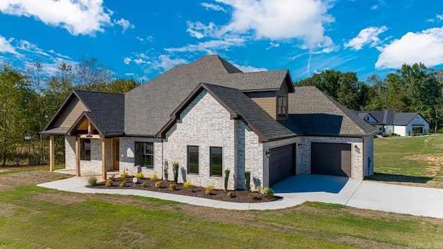 view of front facade with a front lawn and a garage