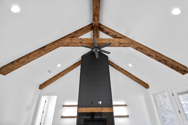 interior details featuring beamed ceiling and ceiling fan