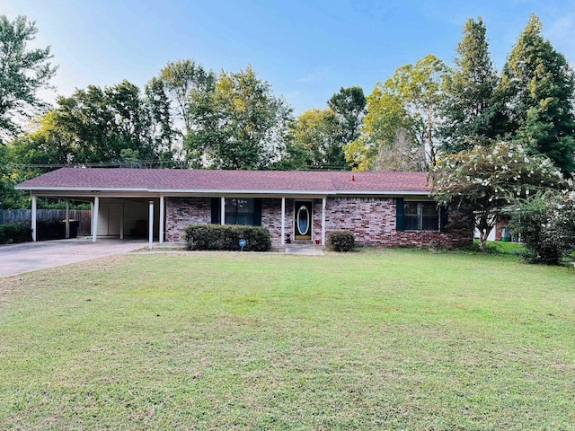 ranch-style home with a front lawn and a carport