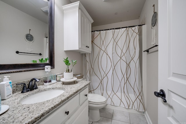 bathroom with vanity, a shower with curtain, tile patterned floors, and toilet