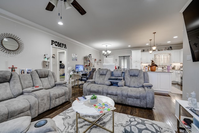 living room featuring sink, ceiling fan, crown molding, and dark hardwood / wood-style floors