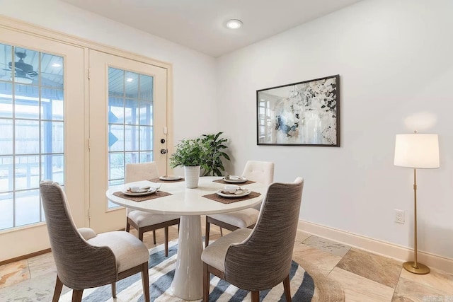 dining room featuring plenty of natural light