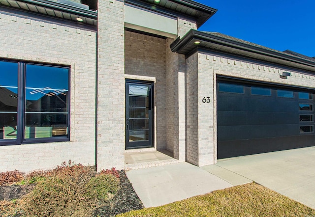 property entrance featuring a garage