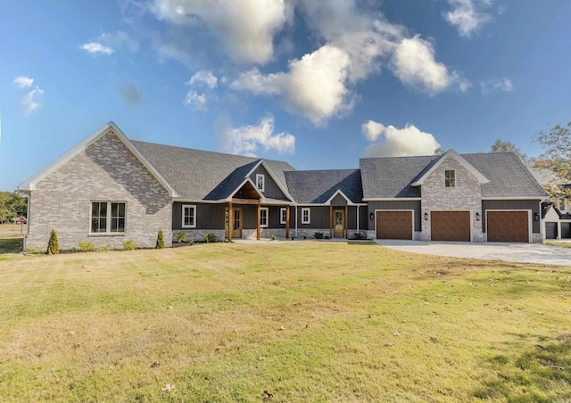 craftsman-style house with a garage and a front lawn