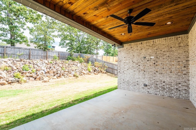 view of patio featuring ceiling fan