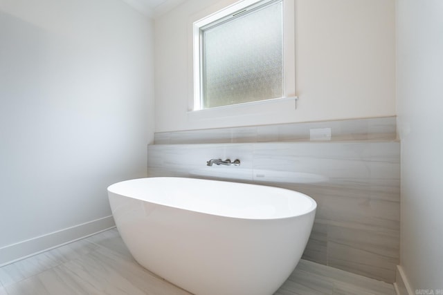 bathroom with a washtub