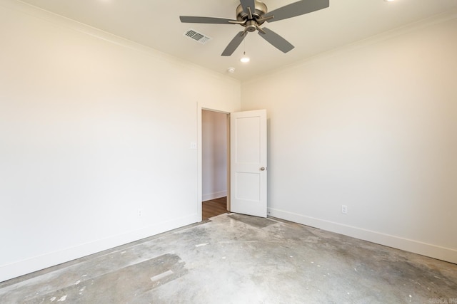 unfurnished room with concrete flooring, ceiling fan, and ornamental molding