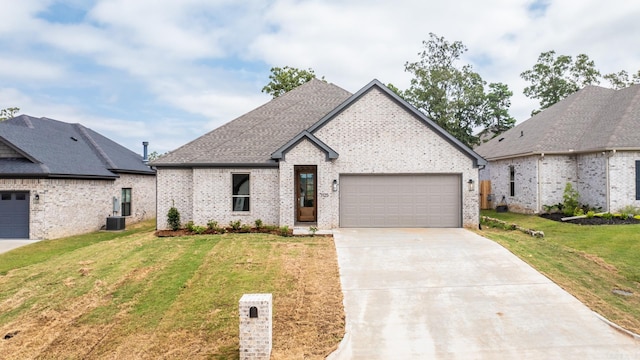 french provincial home featuring a front yard