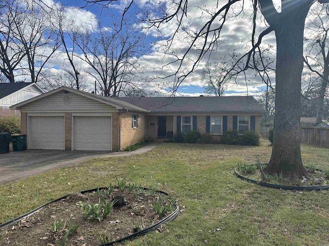 single story home featuring a front yard and a garage