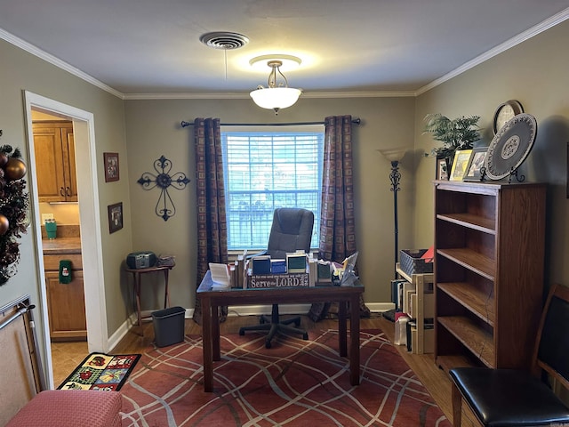 office featuring hardwood / wood-style flooring and crown molding