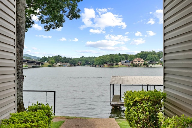 property view of water featuring a boat dock