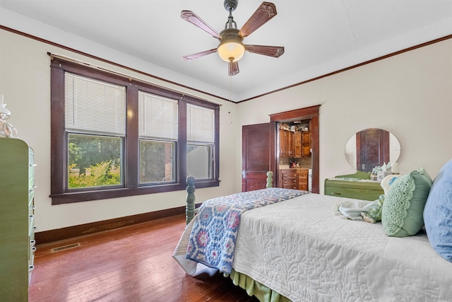 bedroom with ceiling fan and wood-type flooring