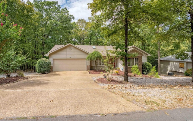 single story home featuring a garage