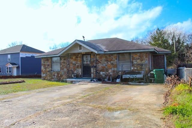 view of front of home with stone siding