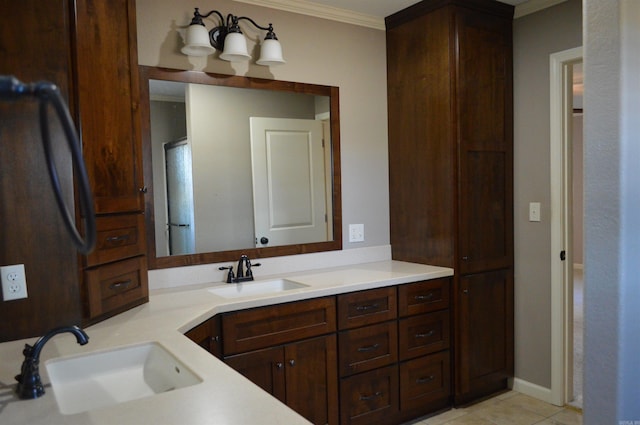 bathroom with vanity, tile patterned floors, and crown molding