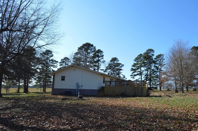 view of property exterior featuring a deck