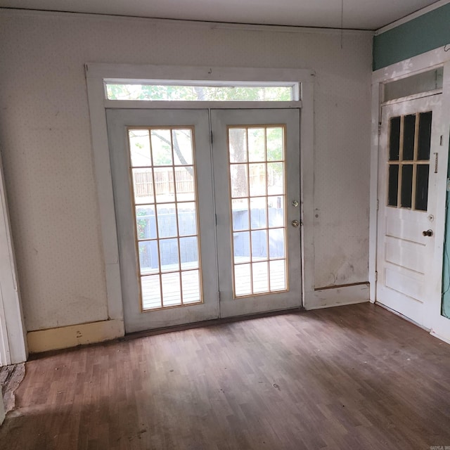 entryway with hardwood / wood-style floors