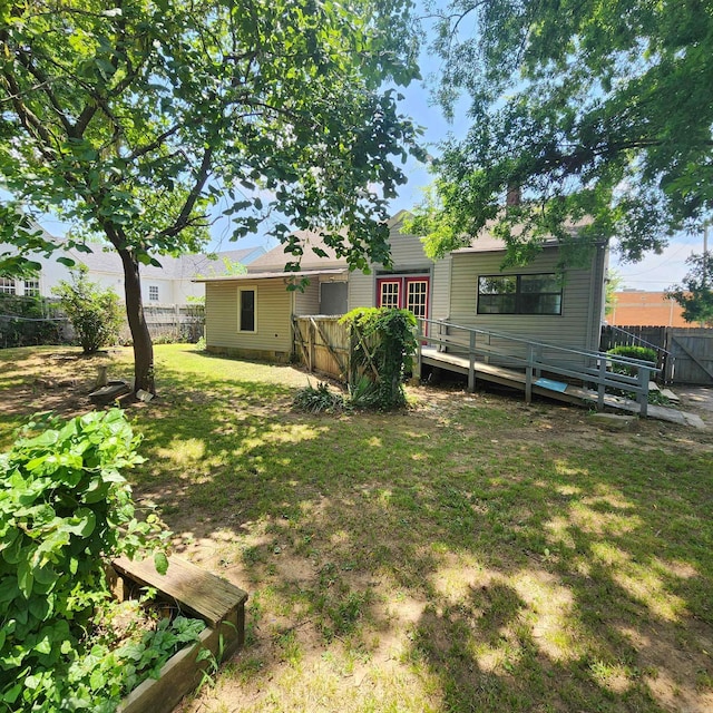 view of yard featuring a deck