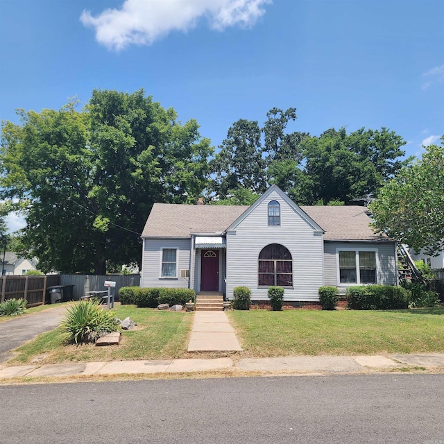 view of front of home with a front yard