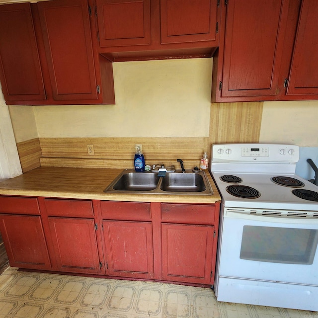 kitchen with sink and white electric stove