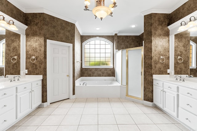 bathroom with tile patterned floors, separate shower and tub, ornamental molding, and an inviting chandelier