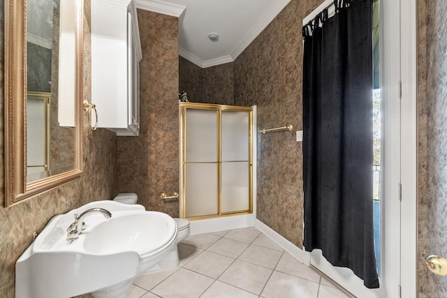 bathroom with tile patterned flooring, a healthy amount of sunlight, crown molding, and walk in shower