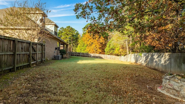 view of yard featuring central AC