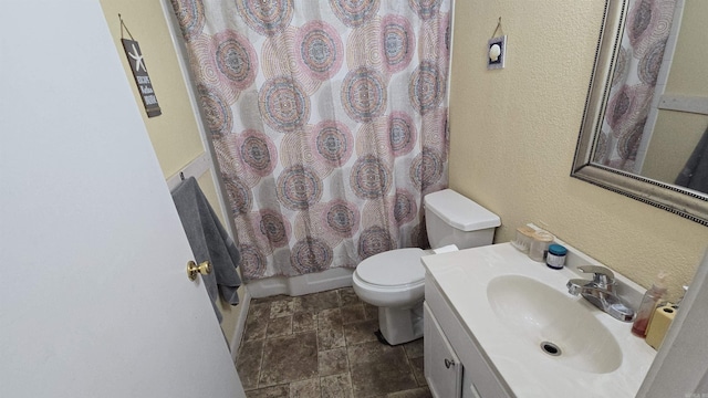 full bathroom featuring vanity, toilet, and shower / bath combo with shower curtain