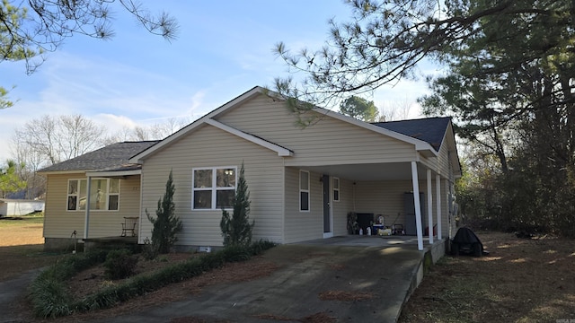 view of front of property with a carport