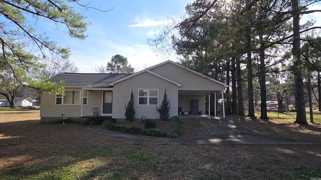 view of front of property with a carport