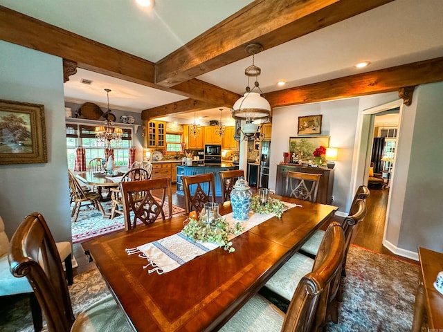 dining room featuring hardwood / wood-style flooring, beam ceiling, and a chandelier