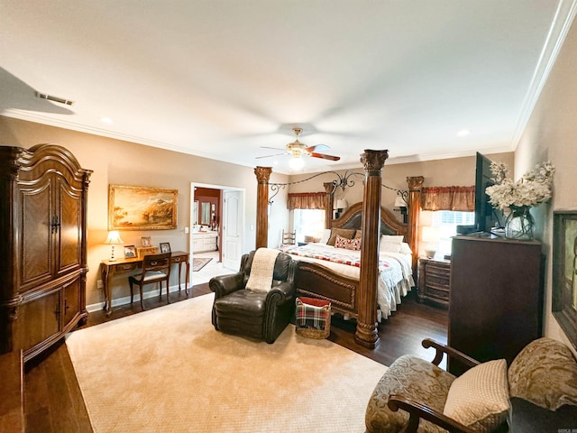 bedroom with ceiling fan, dark wood-type flooring, and ornamental molding