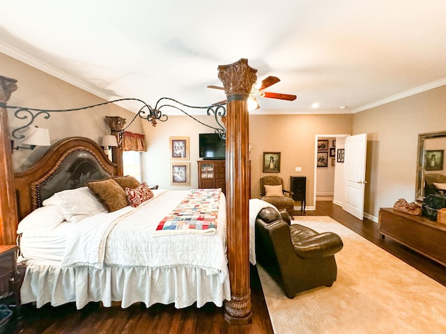 bedroom with ceiling fan, hardwood / wood-style floors, and ornamental molding