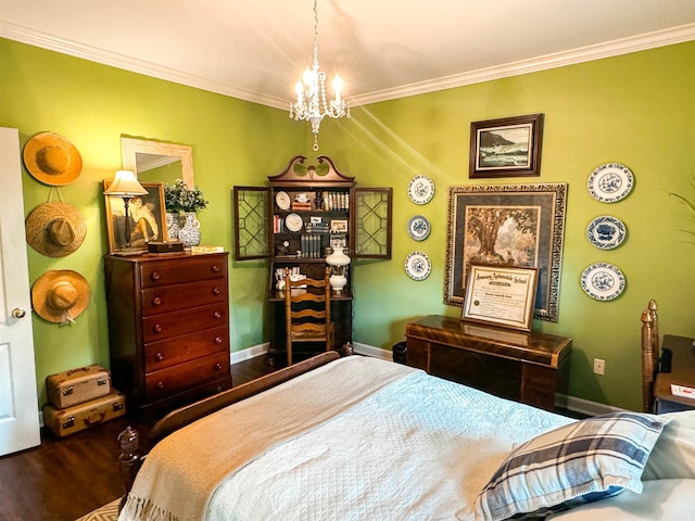 bedroom featuring a chandelier, hardwood / wood-style flooring, and ornamental molding