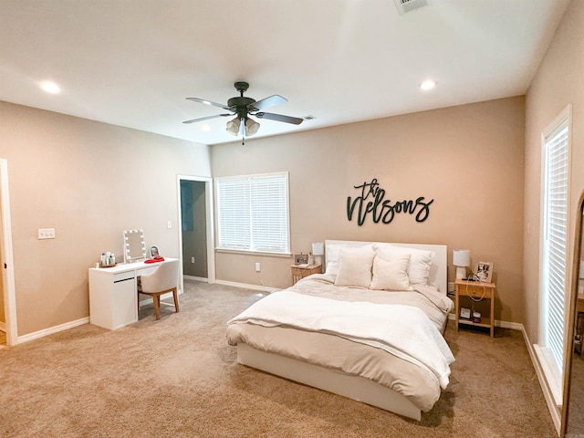 carpeted bedroom with ceiling fan