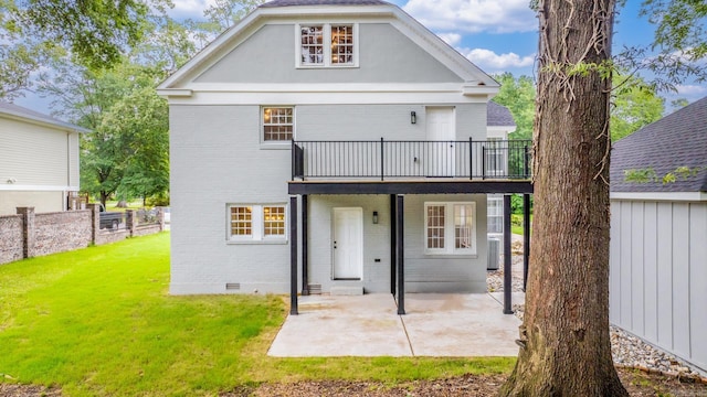 back of property with central AC, a patio, a deck, and a lawn