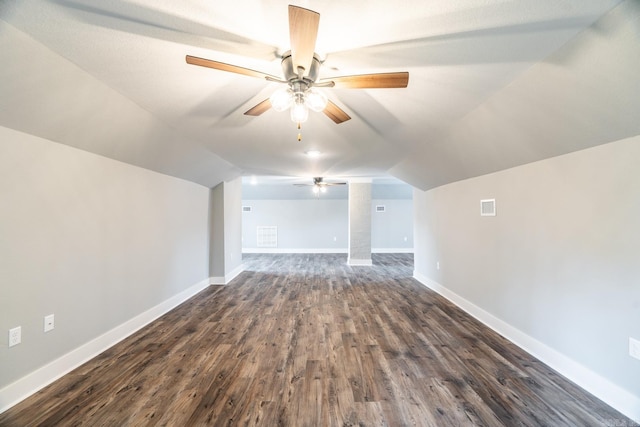 bonus room featuring dark wood-type flooring, ceiling fan, and lofted ceiling