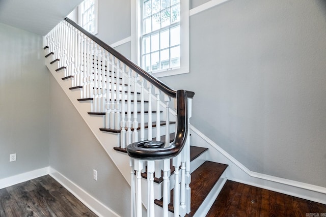 stairs with wood-type flooring