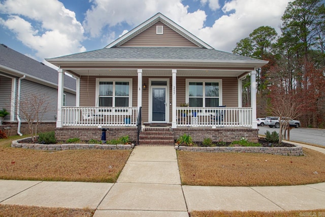 bungalow-style home with covered porch