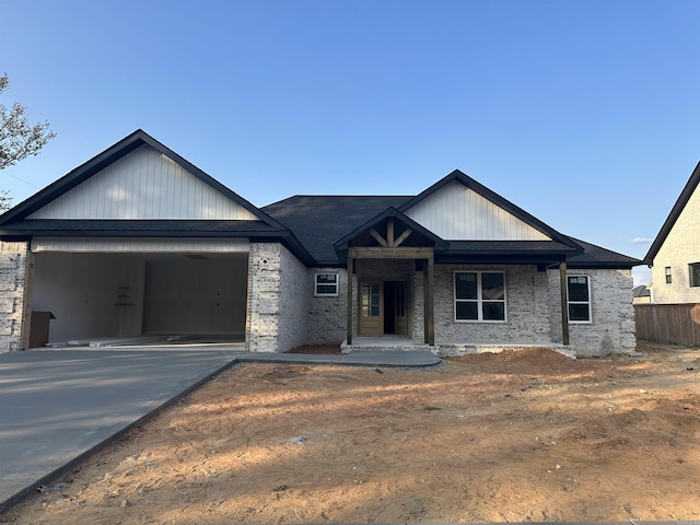 view of front of property with a garage