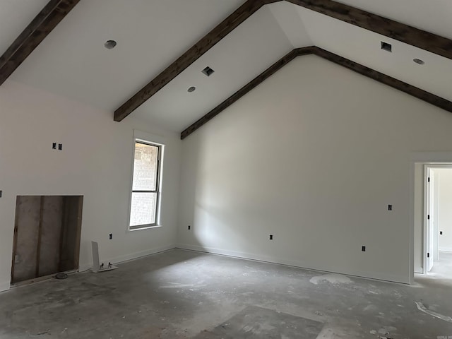 unfurnished living room featuring high vaulted ceiling